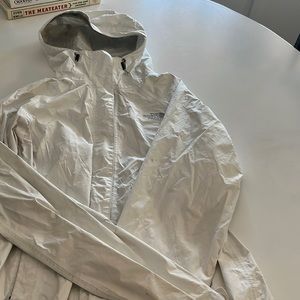 The north face white rain jacket, size xs